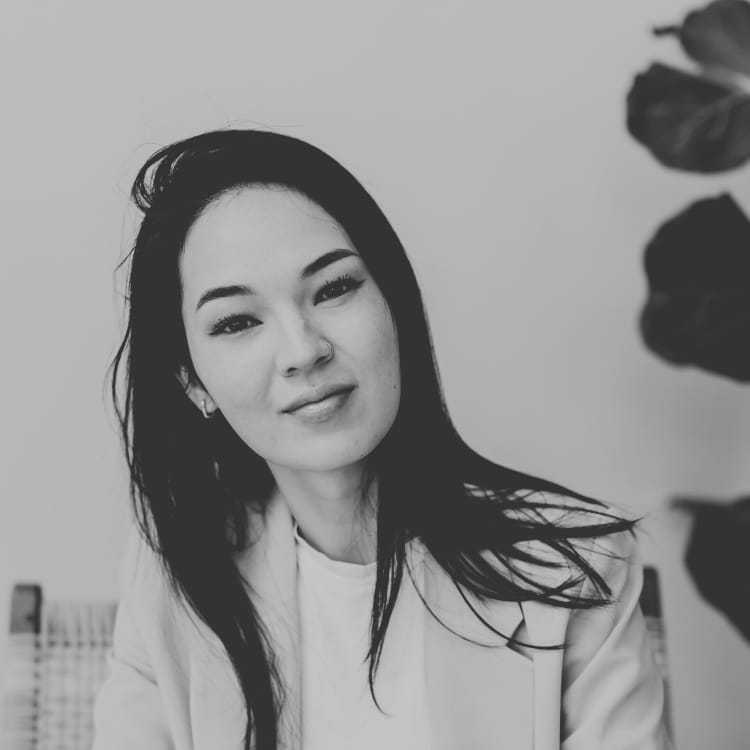 Portrait of Avery, a professional stylist at Jubi Salon, showcasing their expertise and style.